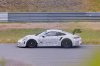 porsche-secretly-testing-racing-version-of-new-911-gt3-swan-neck-wing-massive_3.jpg